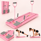 Planche Pilates rose avec accessoires de fitness